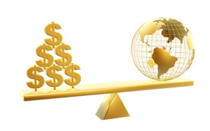 golden dollars and globe symbol on balance